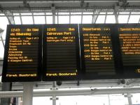 Departure board at Ayr station on 2 March 2012 showing the 12.45 direct coach link with the ferry terminal at Cairnryan.<br><br>[John Yellowlees 02/03/2012]
