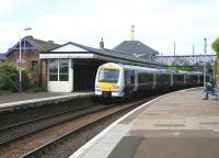 A partially re-liveried ScotRail DMU calls at Burntisland station in May 2005 with a service for Edinburgh.<br><br>[John Furnevel 26/05/2005]