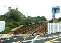 The former Kinloss Station on 12 September 2004. View is east from the level crossing looking towards Elgin. Kinloss station closed to passengers in May 1965. [See image 3657]<br><br>[John Furnevel 12/09/2004]