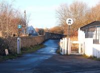Former level crossing at Duddingston on <i>The Innocent Railway</i> in 2004. View west across Duddingston Road towards Holyrood Park and the tunnel to St Leonards. [See image 17619]<br><br>[John Furnevel 10/11/2004]