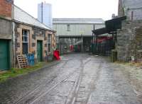 Track still in situ within the old March Street Mills, Peebles. Looking south in December 2005 with George Street behind the camera. The Peebles line closed in 1962.<br><br>[John Furnevel 02/12/2005]