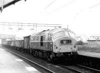 NBL 6130 takes a rake of mineral wagons west through Drumry towards Dumbarton in September 1971. The train is thought to be destined for Shipbreaking Industries at Faslane, where the empty wagons will be loaded with scrap.<br><br>[John Furnevel 08/09/1971]