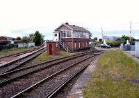 The view from Bedlington station on 25 May 2004 showing the line splitting at Bedlington North Junction. The Morpeth line runs to the left of the box with the route to North Blyth and Ashington to the right. <br><br>[John Furnevel 25/05/2004]