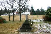 The stairway from the platform to Victoria Lodge itself in February 2006. Around the halfway mark the path crosses the trackbed of the line that once climbed from Victoria Lodge platform to the top of the dam [see image 6635]. <br><br>[John Furnevel 01/02/2006]