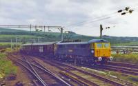 The Royal Train passing Craigendoran Junction behind 87028 <i>Lord President</i>.<br><br>[John Robin 09/07/1981]