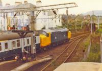 Spotless Class 37 pulls the Royal Train out of Helensburgh Central.<br><br>[John Robin 09/07/1981]