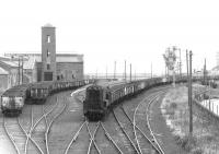 Looking south west over the lines leaving Methil docks to run to Kirkland yard in February 1970. Note the coal-drops in the right background.<br><br>[John Furnevel 17/02/1970]