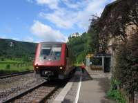 A classic scene in the Danube gorge at Hausen im Tal on 7th June 2017. An<br>
eastbound Donaueschingen-Ulm IRE service awaits departure from this loop<br>
station on the Tuttlingen-Sigmaringen single-track railway, with its<br>
platform signalling centre - but there is only one platform, so two stopping<br>
passenger services cannot cross here. In the background is Schloss Werenwag,<br>
one of several such castles which characterise this stretch of the Danube.<br>
<br><br>[David Spaven 07/06/2017]