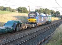The evening sun catches DRS 68026 and 68023 on a special working from Sellafield to Crewe with two empty MOD flask carriers (and a match wagon), seen at Woodacre on 17th July 2017. <br><br>[Mark Bartlett 17/07/2017]