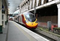 A Virgin Pendolino, forming the 0616 Birmingham New Street – Edinburgh Waverley, photographed shortly after arrival at platform 8 on 13 July 2017. The train will return south as the 1051 service to London Euston.<br><br>[John Furnevel 13/07/2017]
