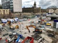 View over the building site at the east side of the station. Part of the new staff buildings under construction can be seen (centre); to the right the demolition of the buildings adjacent to platform 7 is under way.<br><br>[Colin McDonald 28/07/2017]