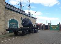 An exhibit at the Hartlepool Maritime Museum that is both rail and marine related. A former LNER flat wagon is loaded with a buoy and sits on an isolated section of track. Behind the wagon the masts of the museum's main exhibit, historic warship <I>HMS Trincomalee</I> can be seen. and Paddle Steamer <I>Wingfield Castle</I> is just behind the camera.<br><br>[Mark Bartlett 25/06/2017]