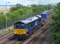 DRS 66432 leaves Fouldubs sidings with the 4A13 Grangemouth - Aberdeen intermodal service.  1 August.<br><br>[Bill Roberton 01/08/2017]