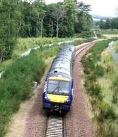 ScotRail 170409 passing Arniston and about to enter the Gore Glen on 30 July 2017. The train is the Sunday morning 0911 Edinburgh - Tweedbank.<br><br>[John Furnevel 30/07/2017]