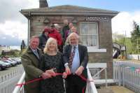 The official re-opening of the former Aberdour signal box in April 2017. Lynette Gray (centre) stands with Colin Whyte (left), ScotRail Alliance commercial property manager, and John Yellowlees (right), honorary ScotRail Alliance community ambassador.<br><br>[ScotRail 25/04/2017]