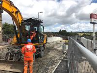 With the temporary services and footbridge now removed and the new Station Road bridge open to pedestrians, approach road resurfacing work is in progress a few days before the bridge is due to be opened to traffic.<br><br>[Colin McDonald 03/08/2017]