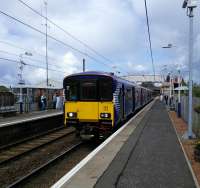 A terminating service from Dalmuir at Whifflet on 5 August. Confusingly for the uninitiated trains for Glasgow leave in both directions here. Not this one though as the driver had to explain to passengers on the platform, a touch peevishly.<br><br>[David Panton 05/08/2017]
