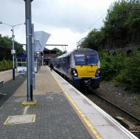 A Dalmuir to Cumbernauld service at Bellgrove on 5 August. There's not really such a place as Bellgrove; it's just the name of a Street here in Dennistoun (which might have been a more helpful name).<br><br>[David Panton 05/08/2017]