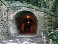 The south western portal of Colinton Tunnel on the Balerno branch. Photographed on 27 July 2017 from the site of Colinton station. The tunnel, which is on a contnuous south west to north curve throughout its 153 yard length, now forms part of the Water of Leith walkway. For a view of the north portal [see image 60150].    <br><br>[John Furnevel 27/07/2017]
