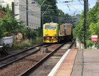 Network Rail MPV 98954 on its way from Mossend yard to Slateford depot approaching Slateford station on 10 August 2017. The unit is in the process of crossing over to the down line in order to reach the single lead Slateford Junction.<br><br>[John Furnevel 10/08/2017]