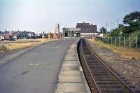 The wide, open vista that was the setting for Cromer (formerly Cromer Beach) station on 3rd July 1976. With the removal of all the sidings and goods infrastructure after 1970, the station became surrounded by disused land. Since then, building developments have closed in from all sides, reducing the footprint of the station and the impression of spaciousness.<br><br>[Mark Dufton 03/07/1976]