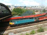A Virgin Cross Country service about to pass below Bath Road bridge shortly after leaving Bristol Temple Meads on 2 August 2002. The train is hauled by XP64-liveried Brush Type 4 D1733/47853 <I>Rail Express</I>.<br><br>[Ian Dinmore 02/08/2002]