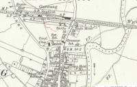 1910 OS map extract of the Knott End Railway's Garstang Town station, then on the outskirts of the town. The layout includes the island platform, goods shed carriage sheds and also the engine shed of this independent railway, later the smallest constituent of the LMS. The station closed to passengers in 1930 and to goods in 1965. The station site was later cleared for housing but before that happened the engine shed was dismantled and later re-erected less than half a mile away at a local hauliers depot [See image 60593]. Reproduced with the permission of the National Library of Scotland http://maps.nls.uk/index.html.<br><br>[Mark Bartlett //1910]