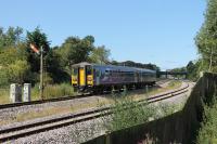 Two Class 153 single units form a Preston to Blackpool North service seen approaching Poulton station on 26th August 2017. The semaphore on the down line is in its last year of operation and a new AWS ramp can be seen on the Up line although masts have not been erected at this location yet.<br><br>[Mark Bartlett 26/08/2017]
