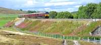 Royal Scotsman with 66843 for Aviemore incorporating a stop at Carrbidge before an overnight at Boat of Garten. The location is near Moy on the Highland Main Line.<br><br>[Ian Millar 30/08/2017]