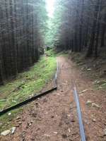 This was on the Great Glen Way a couple of miles east of Drumnadrochit. A TV company laid a continuous O gauge railway track from Fort William to Inverness, a few miles of track had still to be collected.<br><br>[Alan Cormack 17/07/2017]