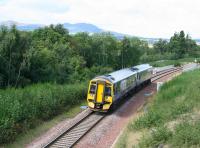 ScotRail 158715 forming the 1154 Edinburgh – Tweedbank on 6 September 2017, seen here shortly after crossing the Gore Glen bridge over the A7.<br><br>[John Furnevel 06/09/2017]