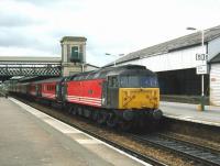 A Virgin CrossCountry service bound for Bristol, recently arrived at Exeter St Davids platform 5 on 4 June 2002. Locomotive in charge is 47741 <I>Resilient</I>. <br><br>[Ian Dinmore 04/06/2002]