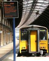 Northern 150211 awaiting departure time at York station's platform 8 with the 1211 to Leeds via Harrogate on 29 June 2011. The train had arrived 25 minutes earlier as the 1029 service from Leeds. <br><br>[John Furnevel 29/06/2011]