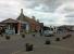 Minehead station is fine and traditional, but the recently built Turntable Café (right) is an acquired taste. The silver 1997 Vauxhall Corsa is arguably as well preserved as the station.<br><br>[Ken Strachan 13/05/2017]