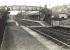 View west at Bowling on 19 April 1957. Note the level crossing part way along the platforms.<br><br>[G H Robin collection by courtesy of the Mitchell Library, Glasgow 19/04/1957]