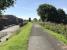 View east towards the Scotstoun East island platform. The black tower in the centre distance is a doocot which has been erected at the west end of the platform.<br><br>[Colin McDonald 12/07/2017]