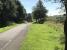 View east towards the flats which have now been built on site of Whiteinch Riverside station. The cycle route returns to street level at this point.<br><br>[Colin McDonald 12/07/2017]