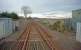 Boat of Kintore Level Crossing looking to Inverness. The former signal box was located to the right here. The lifted up (eastbound) track was also to the right.<br><br>[Ewan Crawford 03/02/1997]