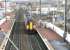 A ScotRail Edinburgh Waverley - Glasgow Central service runs into Slateford station on 1 November 2004.<br><br>[John Furnevel 01/11/2004]