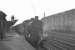 Looking south along platform 1 at Carlisle on a murky 26 October 1964 as Fowler 4F 0-6-0 43953 stands with a parcels train, with loading activity taking place in the background.<br><br>[K A Gray 26/10/1964]