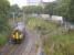 Seen shortly after leaving platform 3 at Anniesland, 156495 forms the 1156 Queen Street via Maryhill service. In the left background strengthening works are in progress on the Strathcona Drive bridge over the main Northbank electric lines.<br><br>[Colin McDonald 20/09/2017]