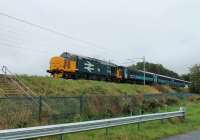 37403 <I>Isle of Mull</I> accelerates away from the Lancaster stop and is seen approaching Morecambe South Junction with 2C47, the Preston to Barrow-in-Furness service on 21st September 2017. <br><br>[Mark Bartlett 21/09/2017]