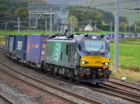DRS 88009 <I>Diana</I> speeds through Abington loops with the Daventry - Mossend Tesco train on 3rd October 2017.<br>
<br>
<br><br>[Bill Roberton 03/10/2017]