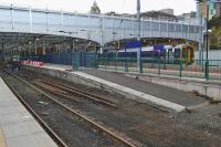 The tracks to platforms 5 and 6 at Waverley have been disconnected and lifted.  158729 waits at platform 3 with the 17.12 to Tweedbank on 15th October 2017.<br>
<br>
<br><br>[Bill Roberton 15/10/2017]