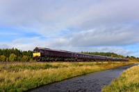 The Royal Scotsman going south at Moy on 10th October 2017. The train is heading for Boat of Garten on the Strathspey Railway, hauled by GBRf 66743.<br>
<br><br>[John Gray 10/10/2017]