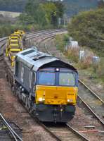 DRS 66424 passes Inverkeithing East Junction with a Barnhill - Millerhill train of recovered track panels on 14th October 2017.  The Perth - Dundee line was closed for track renewals. <br>
<br>
<br><br>[Bill Roberton 14/10/2017]