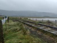 A very wet and windy morning, this is just after south end of Barmouth bridge, hard to believe this track is in use.<br><br>[Alan Cormack 13/10/2017]