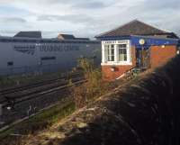 A contrast of old (the signal box) and new (the Network Rail Training Centre) at Larbert. The view looks north just north of the station.<br><br>[John Yellowlees 17/10/2017]