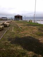 Some remaining track on the middle pier of Granton Harbour, seen on 31st<br>
October 2017 looking north towards the Forth. The station was immediately behind<br>
me, and ahead and to the left was a rail-served ice factory. I'm not sure what that surviving building was, but it was rail-served too.<br>
<br>
<br><br>[David Panton 31/10/2017]