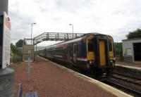 Glasgow bound at Breich showing the very low platforms but modern furniture, the closure notices and the empty surroundings. The village and its bus stop are a 15-minute walk away.<br><br>[John Yellowlees 27/06/2017]